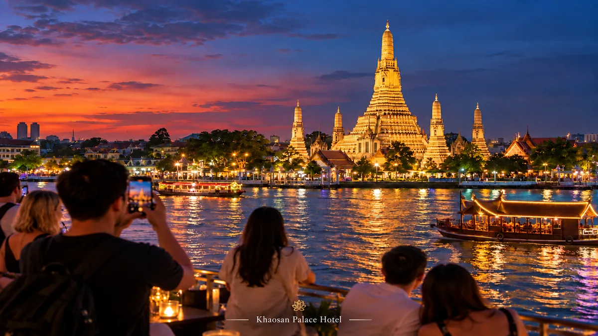 Wat Arun and the Chao Phraya River at twilight in Bangkok